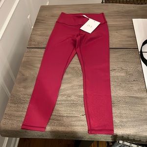 NWT IVL yoga pant, size 4, shimmer raspberry color